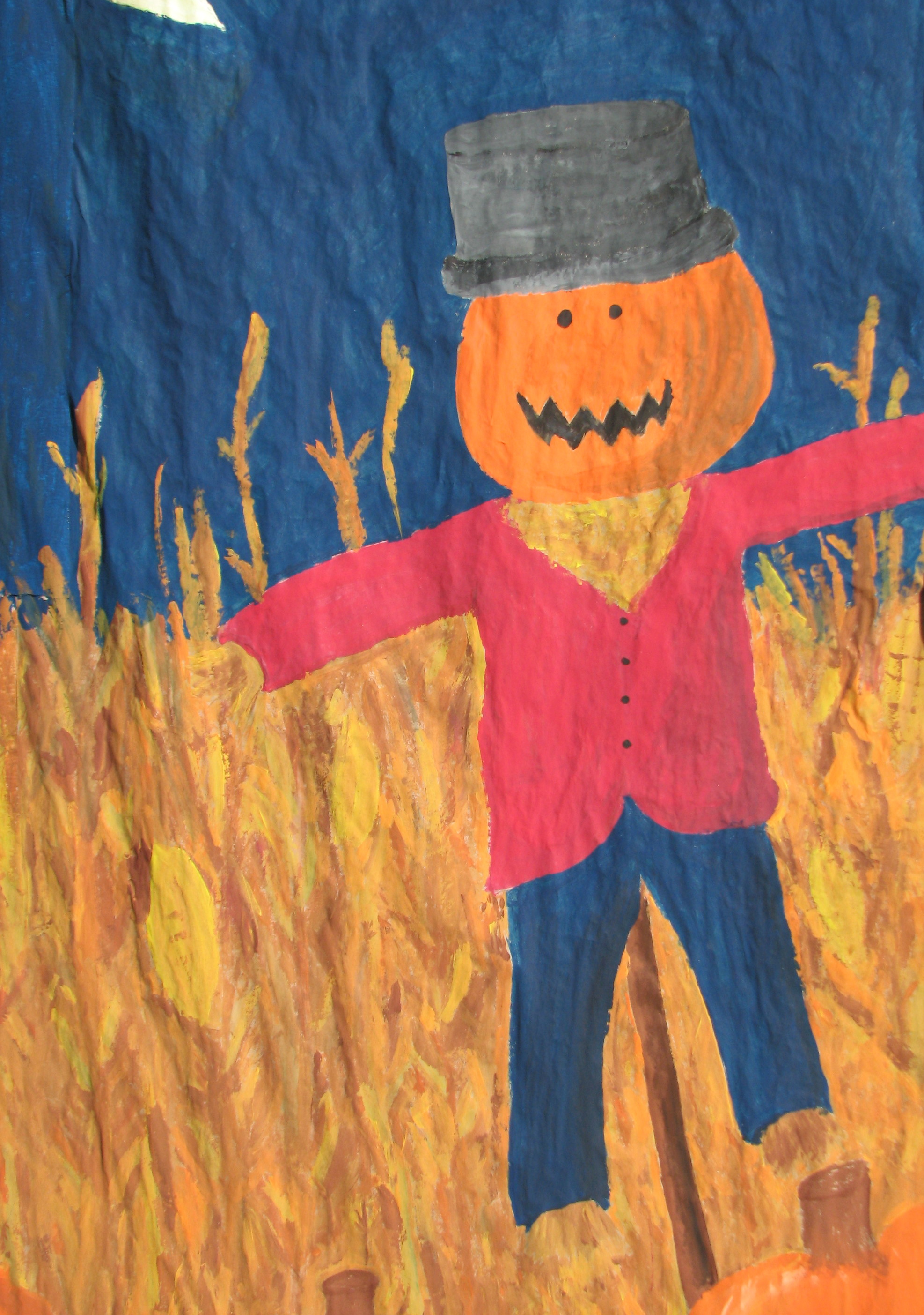 scarecrow in field